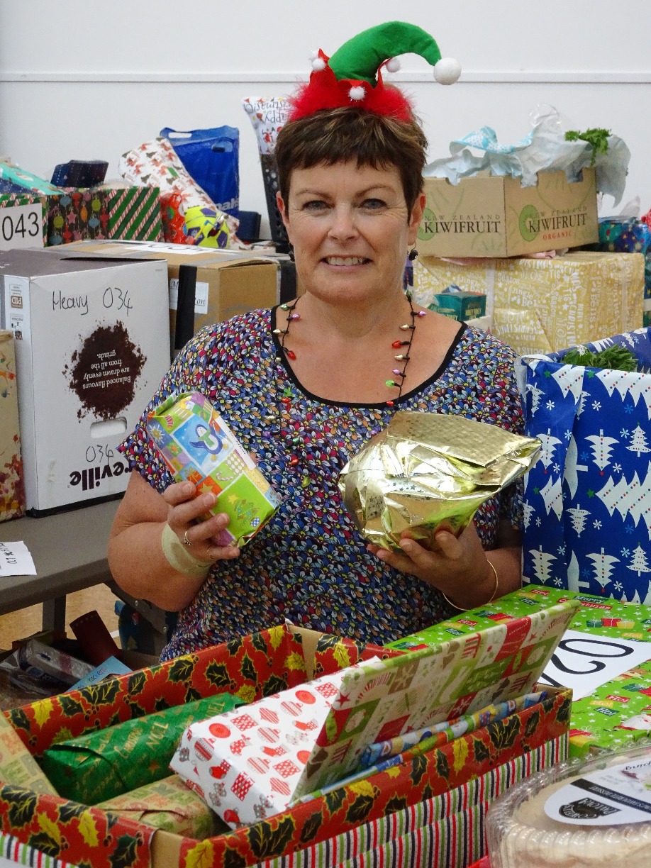 Support A Family Coordinator Glenda Marshall pictured with some of the donated hampers last year